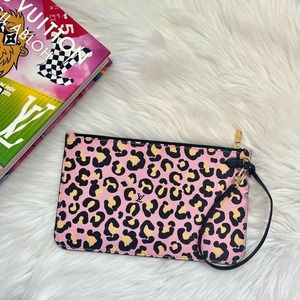 New Louis Vuitton Wild At Heart Neverfull MM Pouch